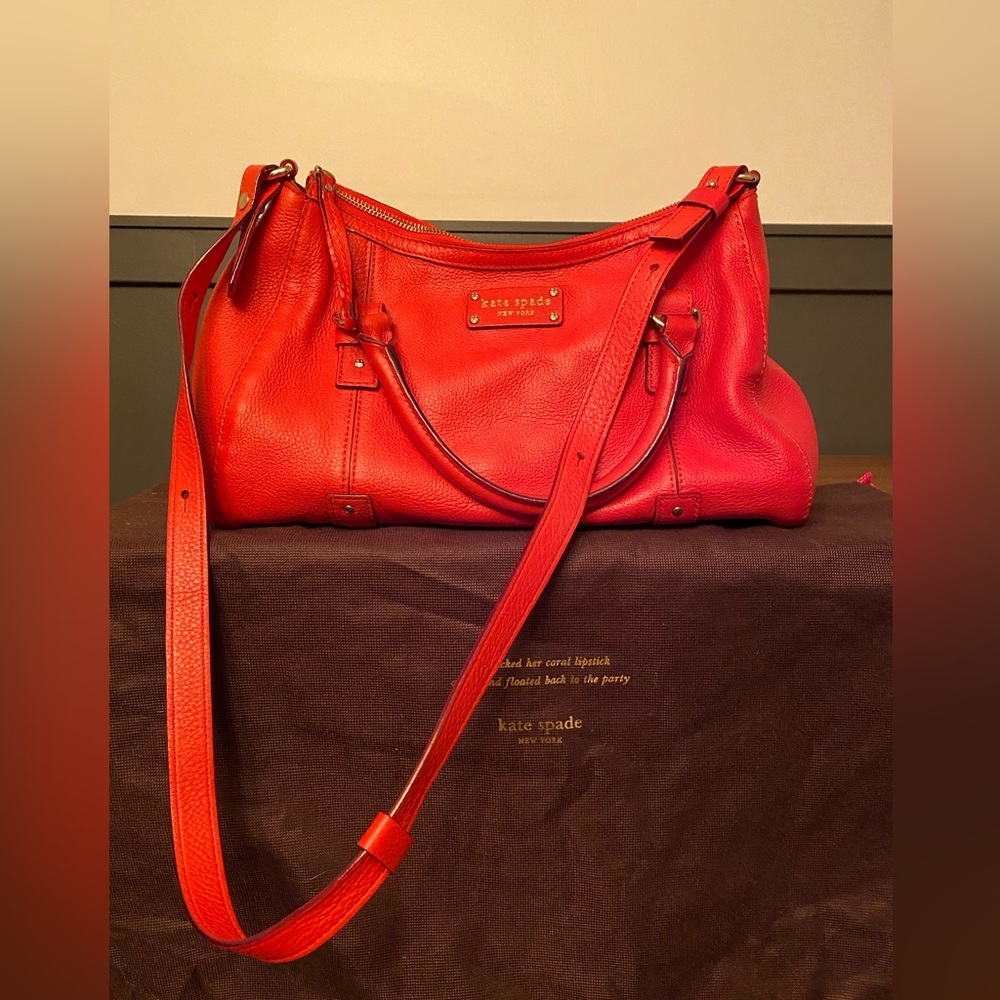 Kate Spade Shoulder bag. Coral red. Polka dot interior. Very good condition.